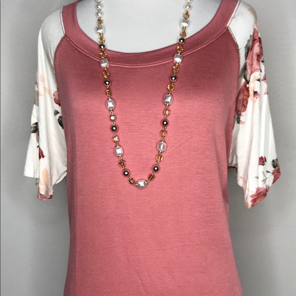 NWT Top with floral sleeve & hidden pockets!